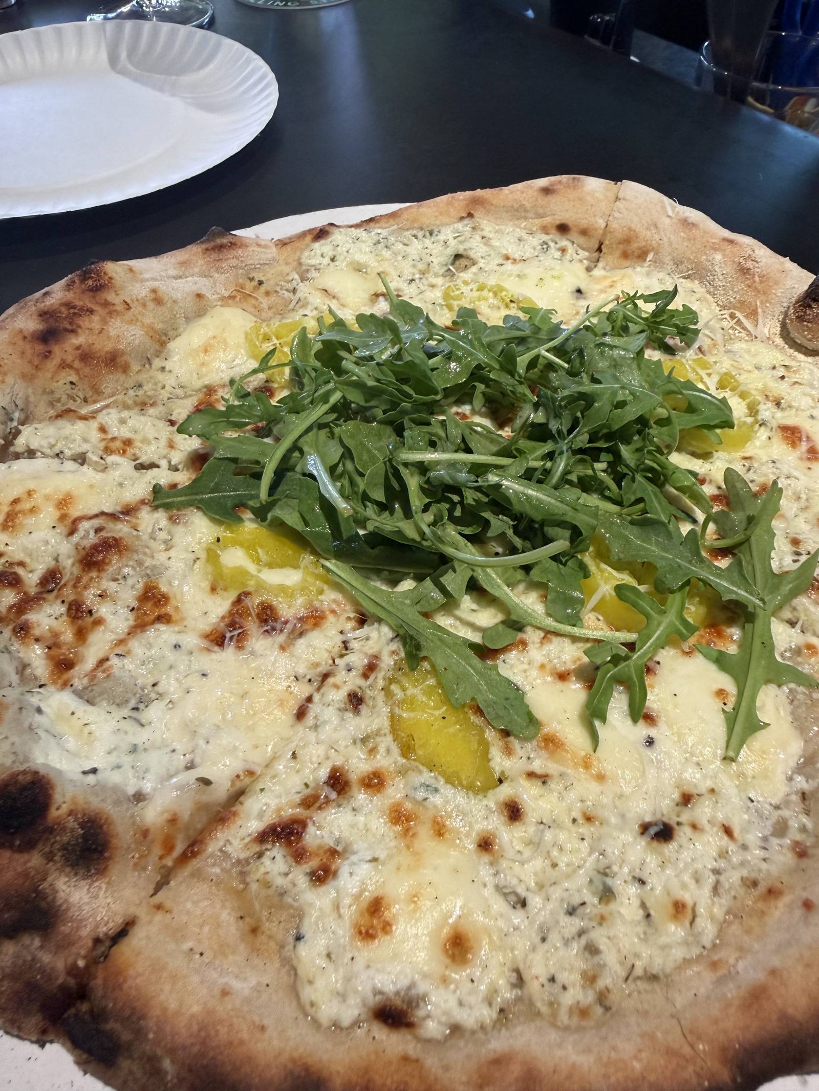 Bianca pizza — three cheese, banana peppers, arugula — at Happy Valley Filling Station